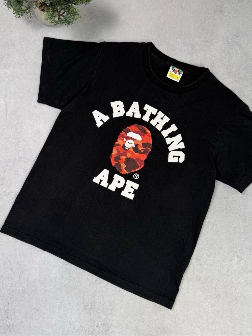 Bape Black Logo Tee with Red Camo Ape Graphic